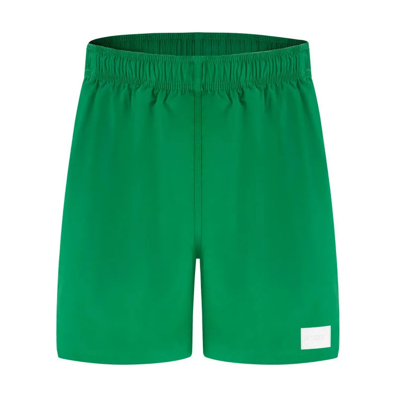 Men's solid-colour quick-drying nylon beach shorts with straight leg opening