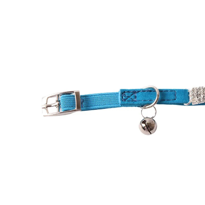 Soft flocking cat collar with elastic buckle in one of six colours on a white background.