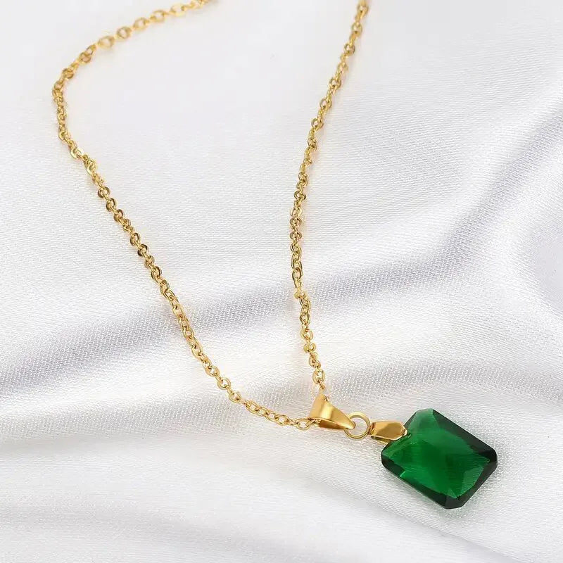 Copper geometric rectangular pendant necklace with quadrilateral details on an O-ring chain