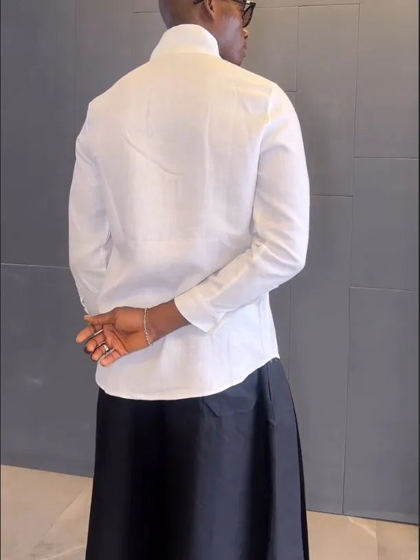 Women's white asymmetric hem shirt and black pleated trousers co-ord set in polyester