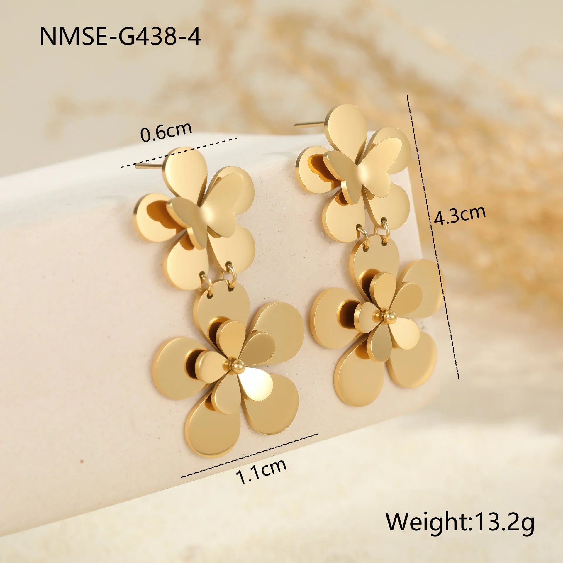 Gold plated stainless steel earrings featuring flower and butterfly geometric design for women