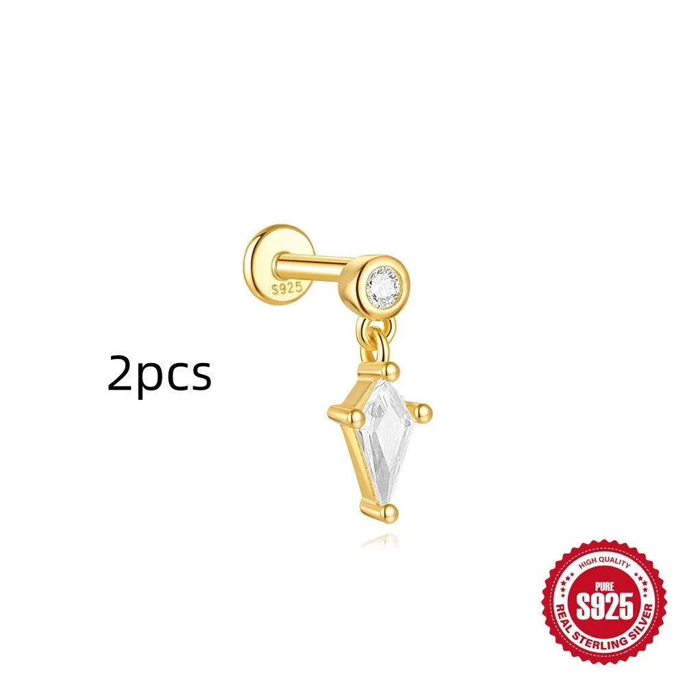 S925 sterling silver geometric kite shaped earring with a chain tassel and rhinestones in a gold colour.