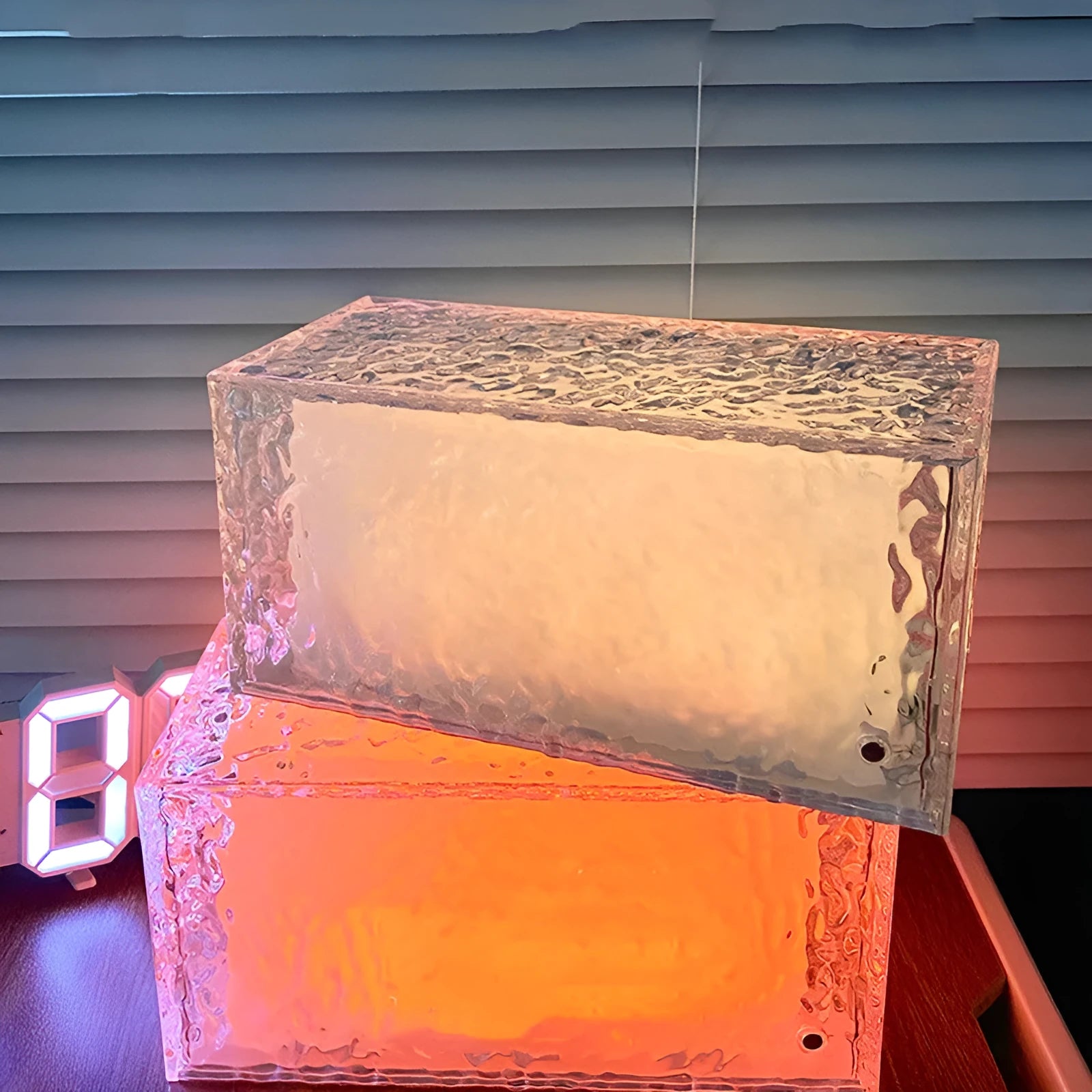 Geometric acrylic night lamp with touch colour control on wooden surface