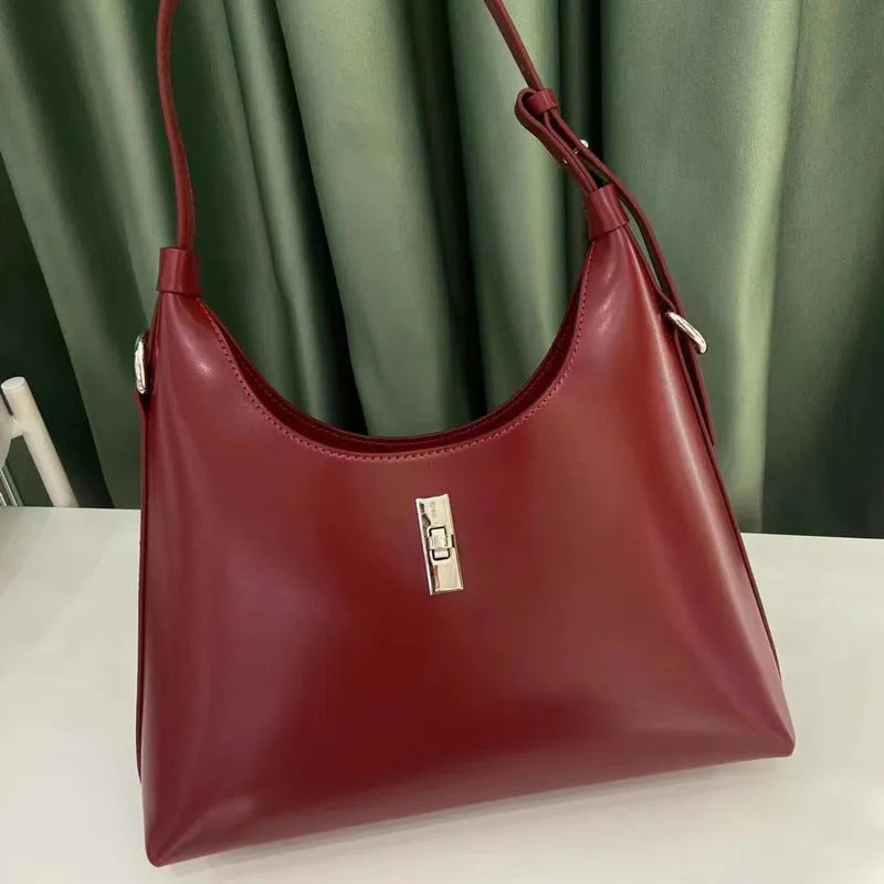 Genuine leather dumpling-shaped crossbody bag with organised compartments in six colour options