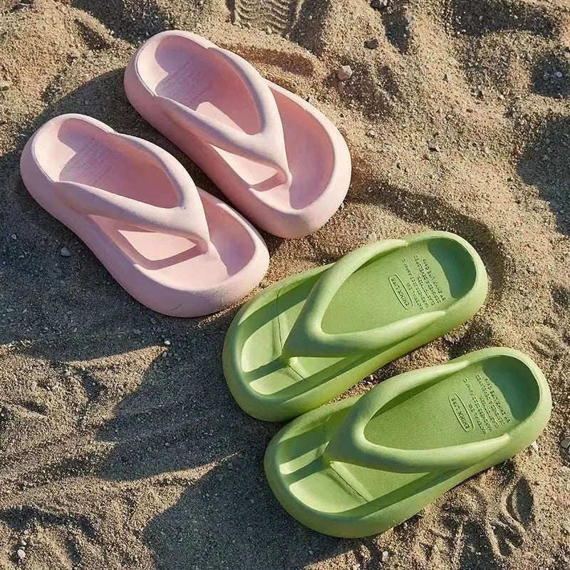 Solid colour EVA flip-flops with thick sole and decorative bow.