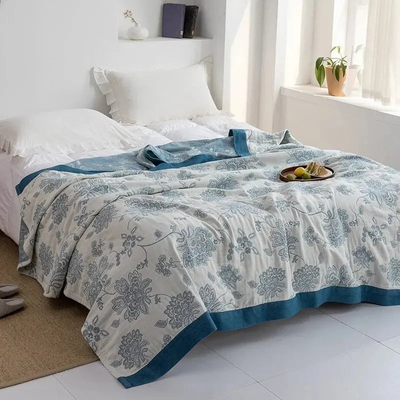 Blue roulette wheel pattern pure cotton five-layer gauze bed sheet blanket showing modern simplicity design