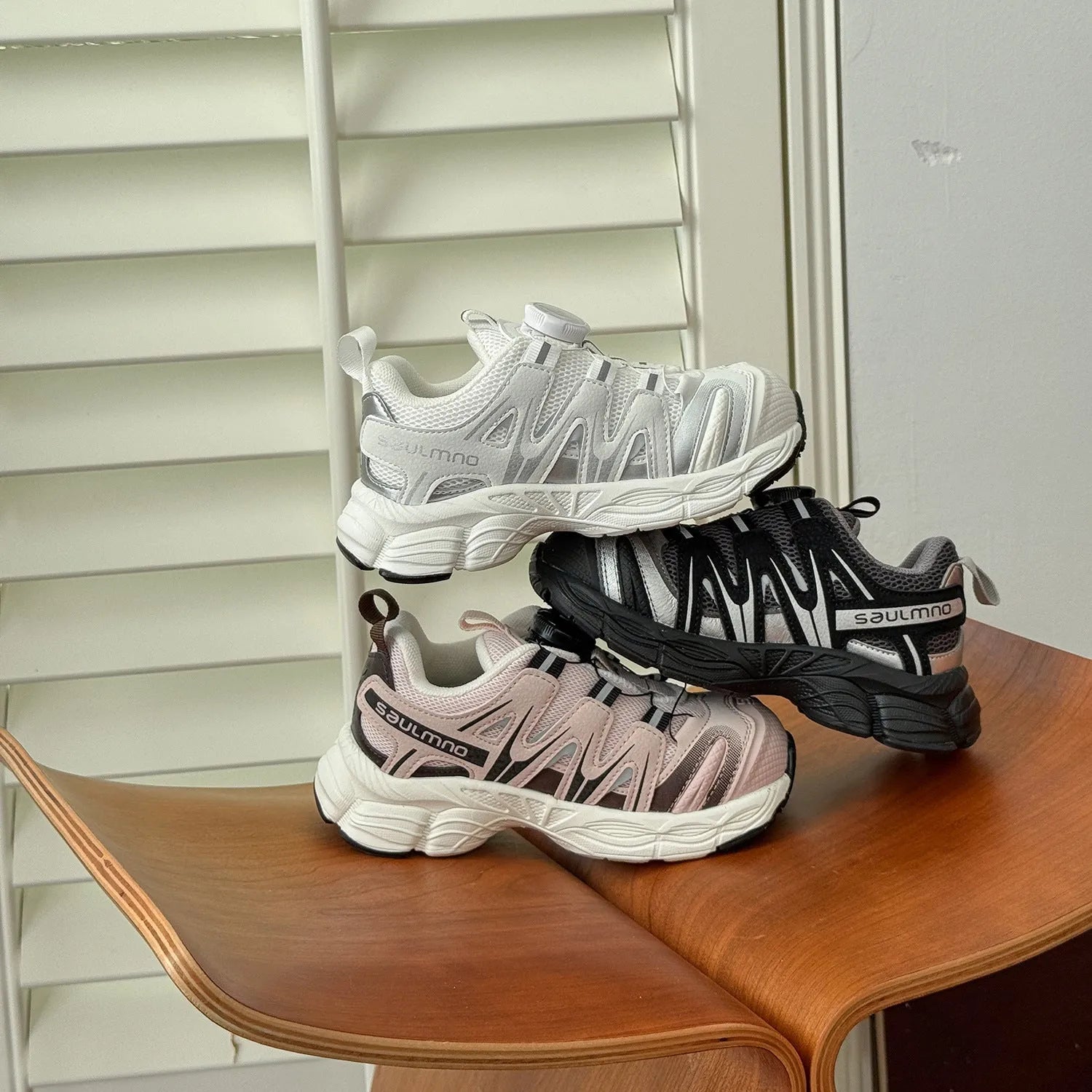 Girls lightweight casual shoes with PU leather mesh upper in black, beige, or pink colours.