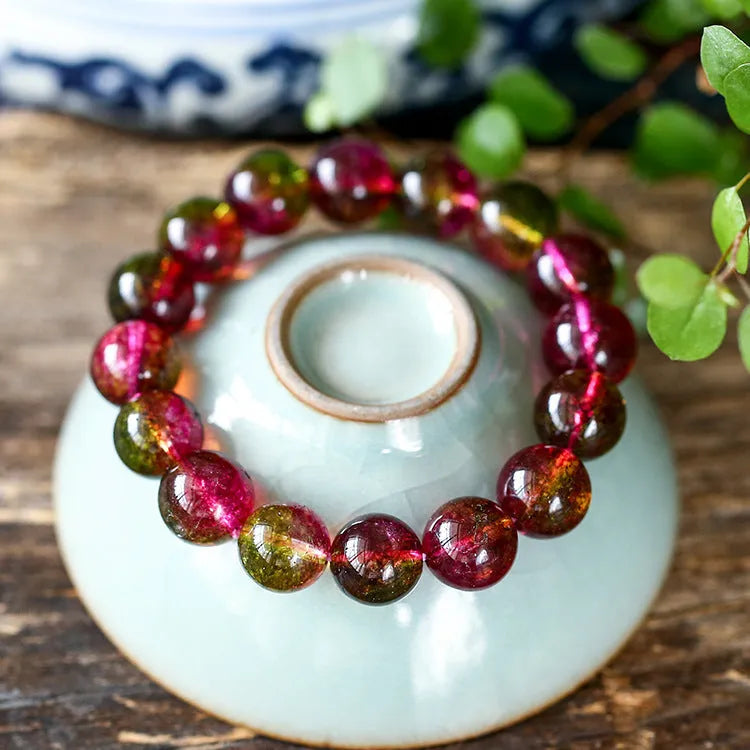 Women's watermelon crystal bracelet showing pink and green natural stone beads in selected size on wrist
