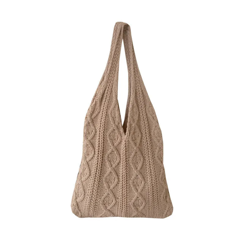 Women's retro-style knitted crochet tote bag with double shoulder straps in a solid colour.
