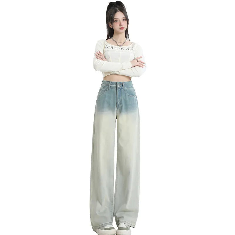 Women's gradient blue straight-leg denim trousers showing wide-leg design