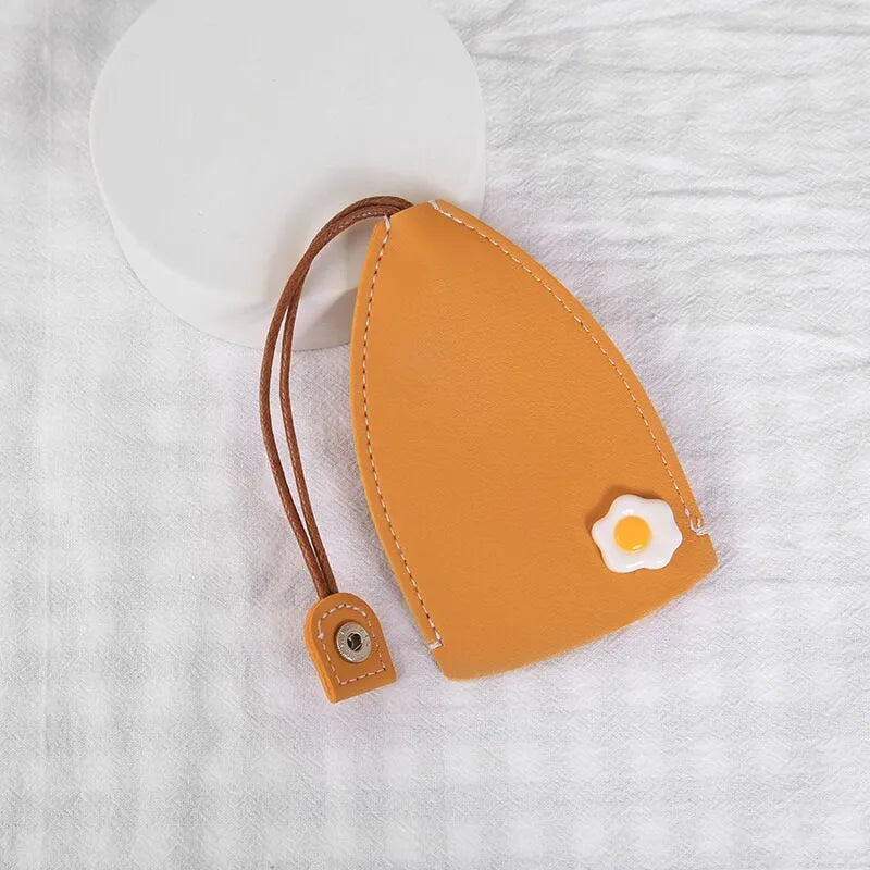 Cartoon-themed PU leather car key case with pull-out mechanism measuring 14x7.5 cm