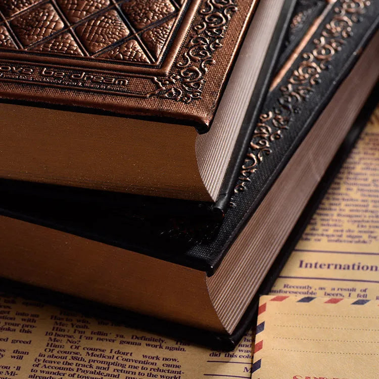 Embossed faux leather notepad with three-dimensional cover design in bronze or black gold colour