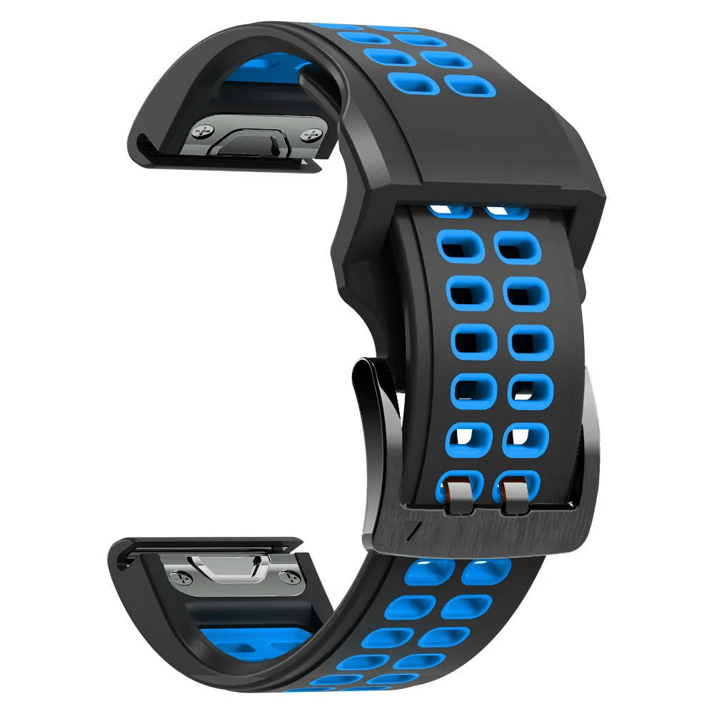 Quick release double-row hole silicone watch strap in black and orange colour on a sports watch.
