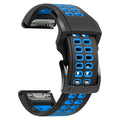 Quick release double-row hole silicone watch strap in black and orange colour on a sports watch.