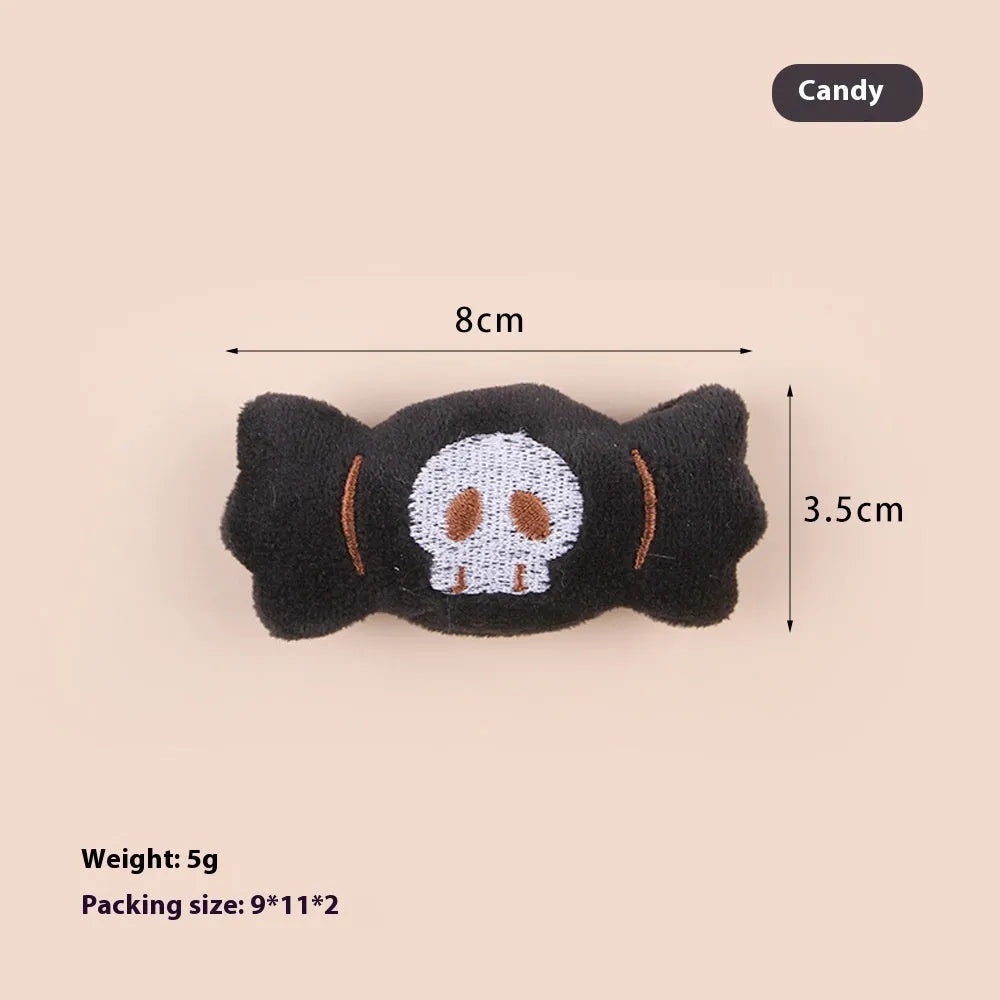 Small plush cat teaser toy with flexible handle in candy, eyes, or skull design