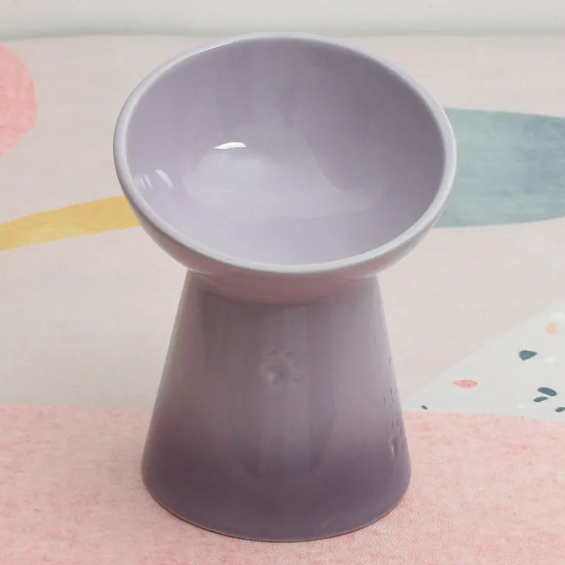 High-foot ceramic pet bowl with chin protector and anti-tumble base design