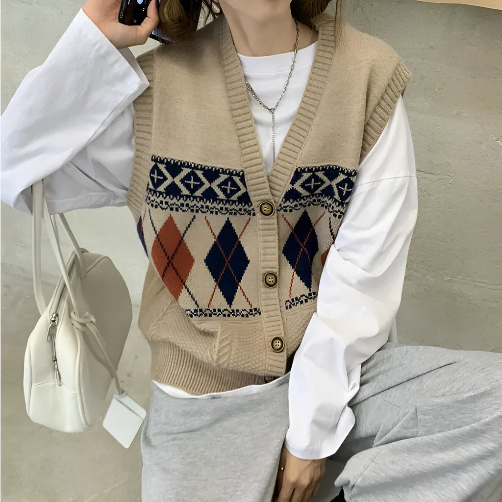 Sleeveless loose diamond plaid cardigan top in khaki colour on a hanger.