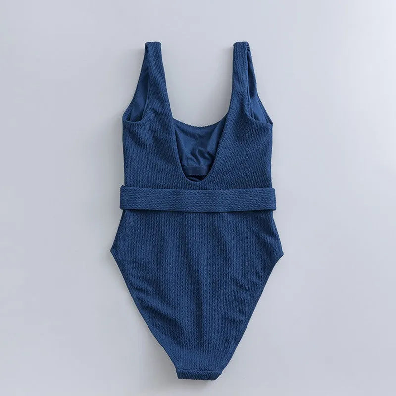 Navy blue women's slim fit one-piece swimsuit with triangle neckline and adjustable chest pads