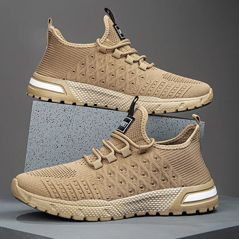 Men's solid colour casual shoe with mesh upper shown in multiple colour options.