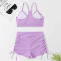 Women's high waist split swimsuit bikini set in black or violet colour with briefs styling