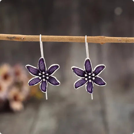 Purple flower-shaped earrings in lightweight alloy metal with electroplated finish