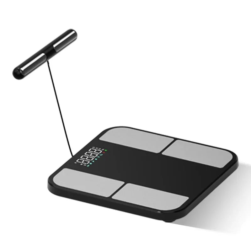 Black electronic body analysis scale with a tempered glass platform on a bathroom floor.