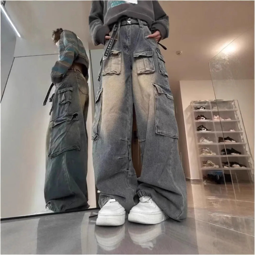 Loose straight-leg denim jeans with multiple pockets and distressed finish in light blue colour