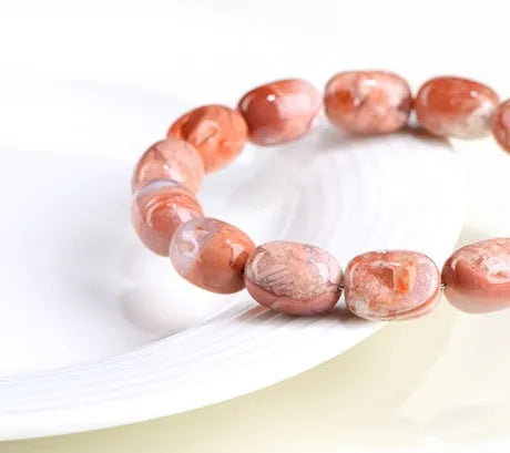 Natural cherry agate barrel bead bracelet with 10x14mm geometry beads and ruyi charm