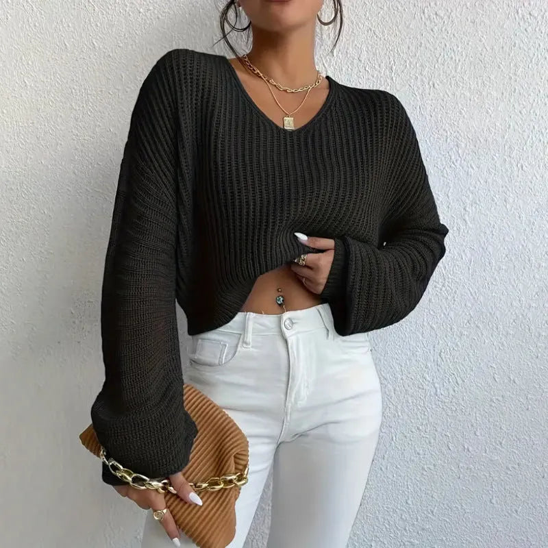 Solid colour long sleeve pullover for women in loose casual fit, shown in available colour options.