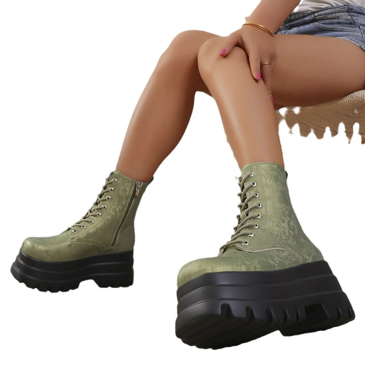 Women's white retro platform boots with patchwork PU upper and chunky rubber sole.