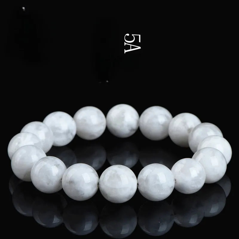 Women's geometric crystal bracelet with natural blizzard snowflake round beads in 5A or 6A colour variations