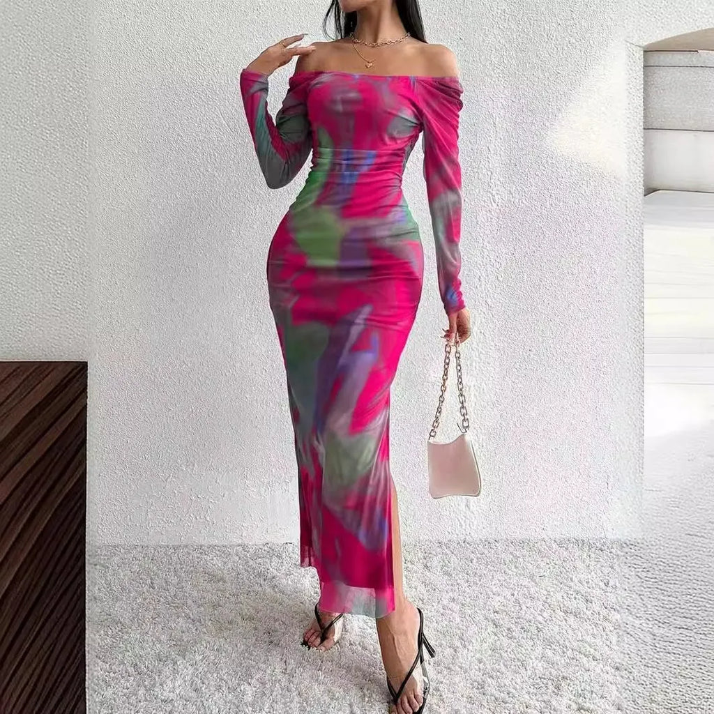 Woman wearing a printed gradient colour mesh fishtail dress with pleats and a square collar