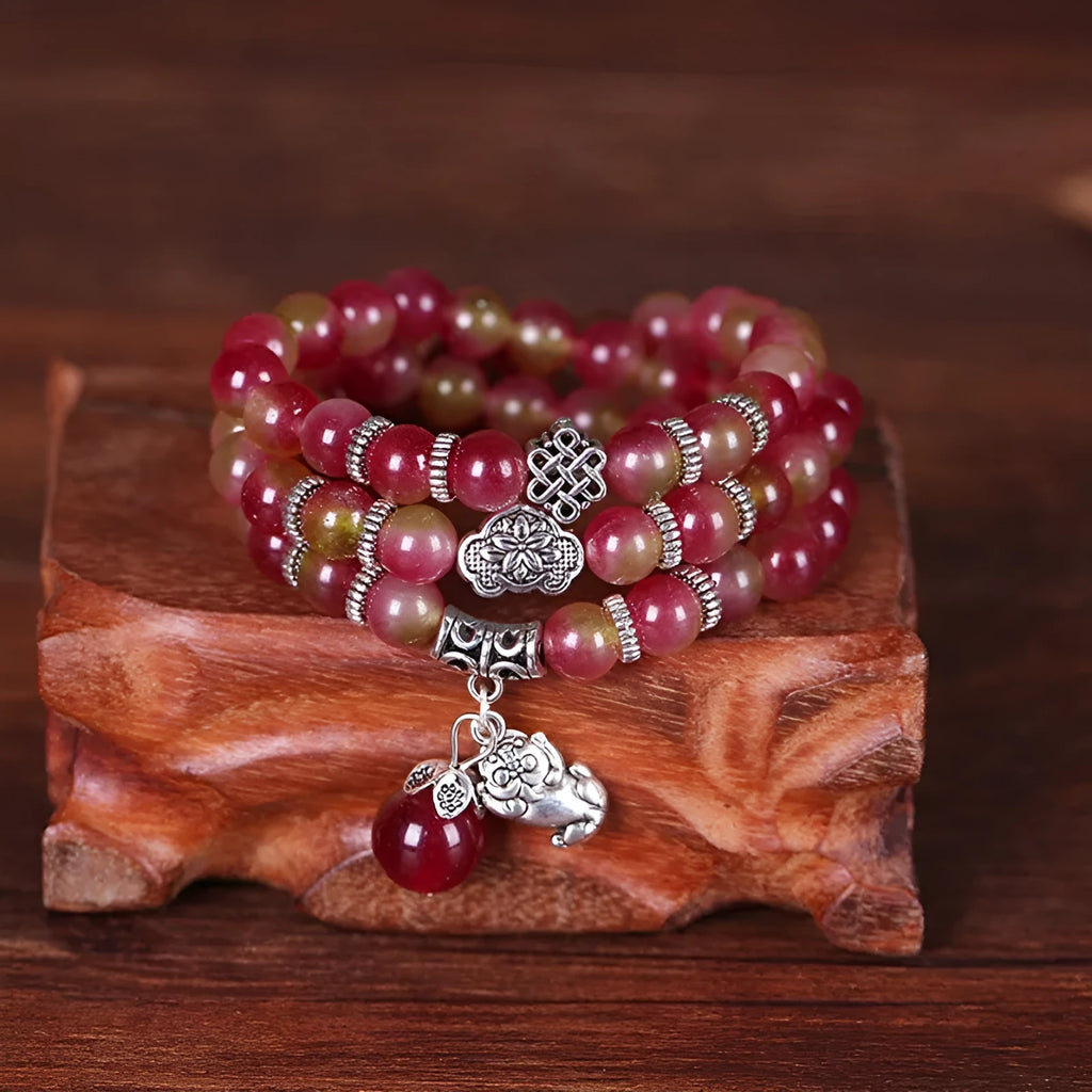 Natural watermelon crystal bracelet with Chinese knot and geometric beads in elephant style