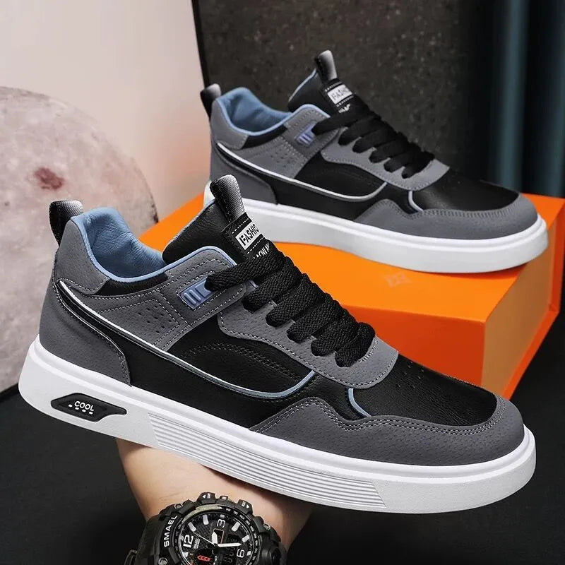 Men's low top canvas board shoes in beige with leather stitching detail and mesh lining