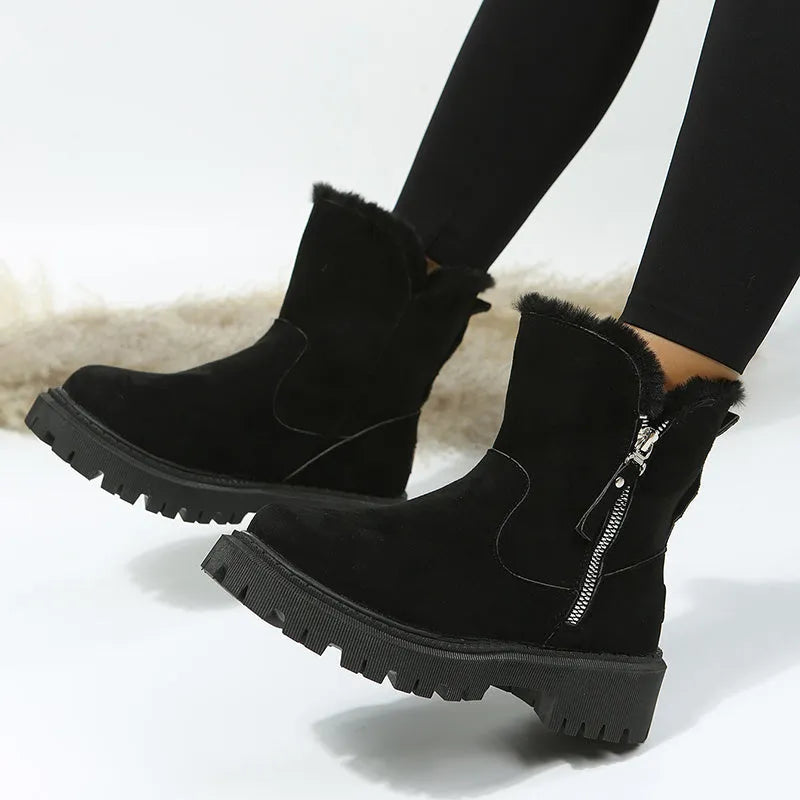 Women's black faux suede high-top snow boots with thick plush lining and a side zipper