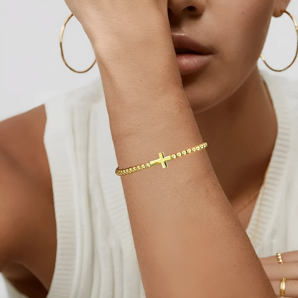 Women's adjustable stainless steel beaded bracelet in a geometric design with round accents.