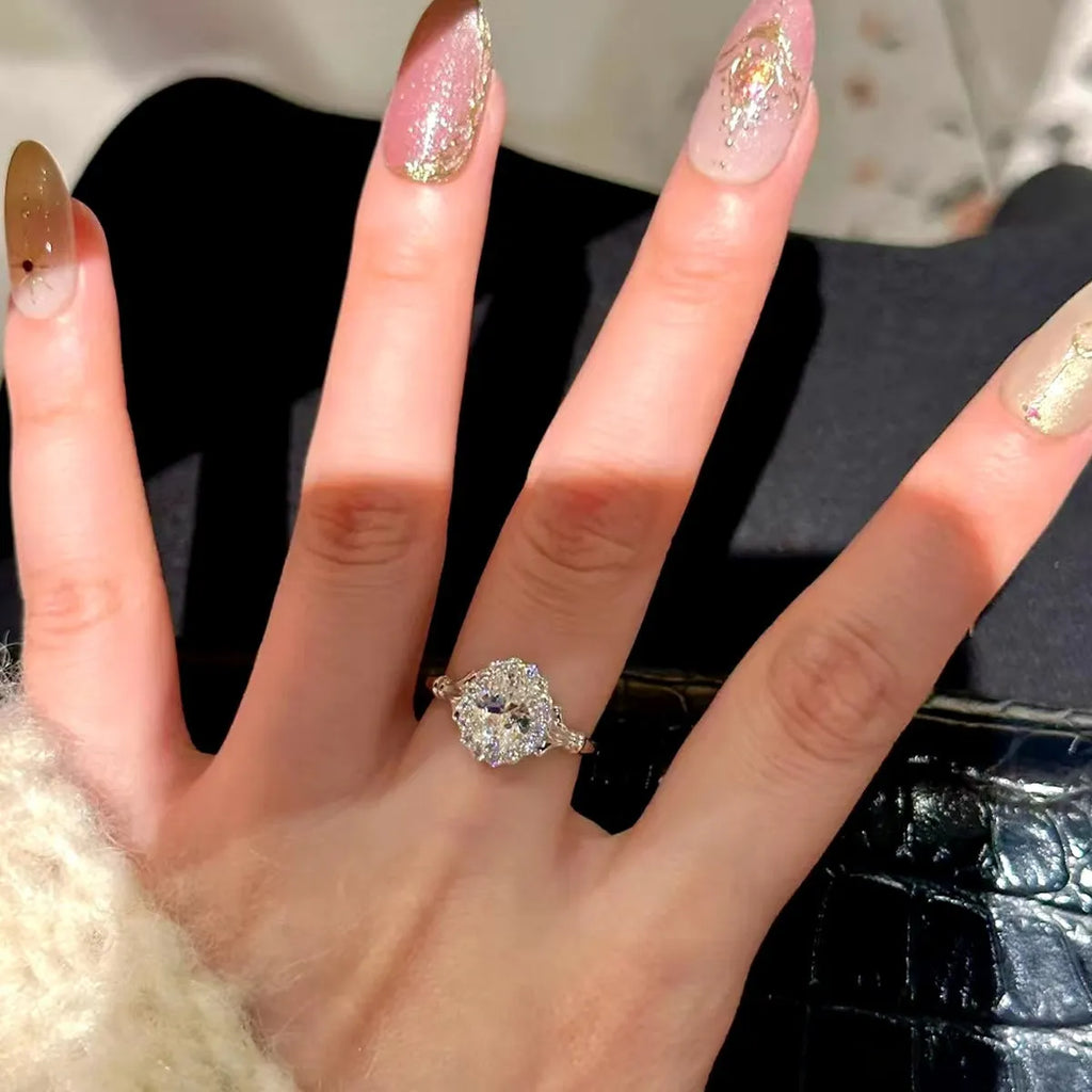 Silver geometric ring with bridal bouquet diamond design and adjustable opening