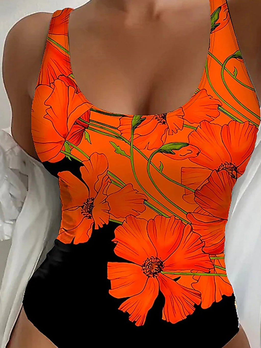 Orange floral print backless one-piece swimsuit on a hanger, slim fit design.