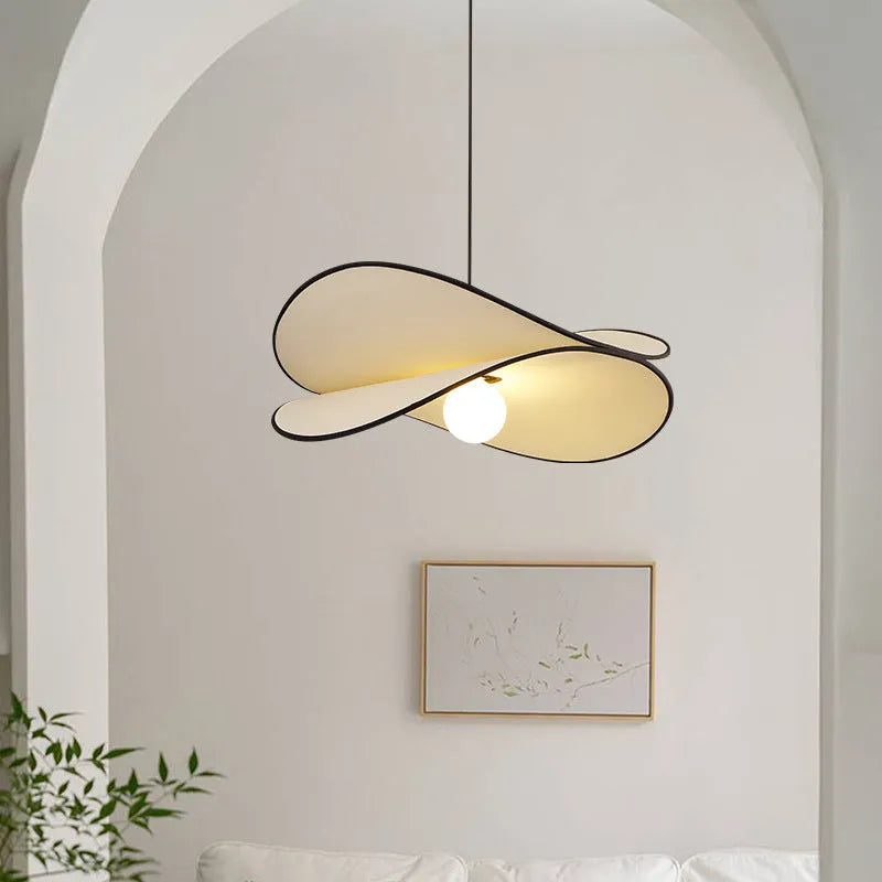 French artistic pendant light with textured fabric potato chip shade in modern simplicity style