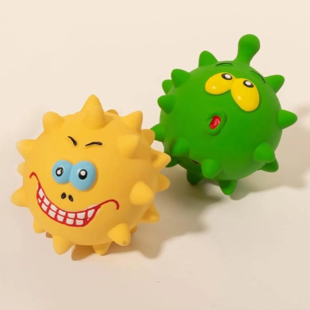 Set of four coloured squeaky dog balls with animal faces and bumpy texture