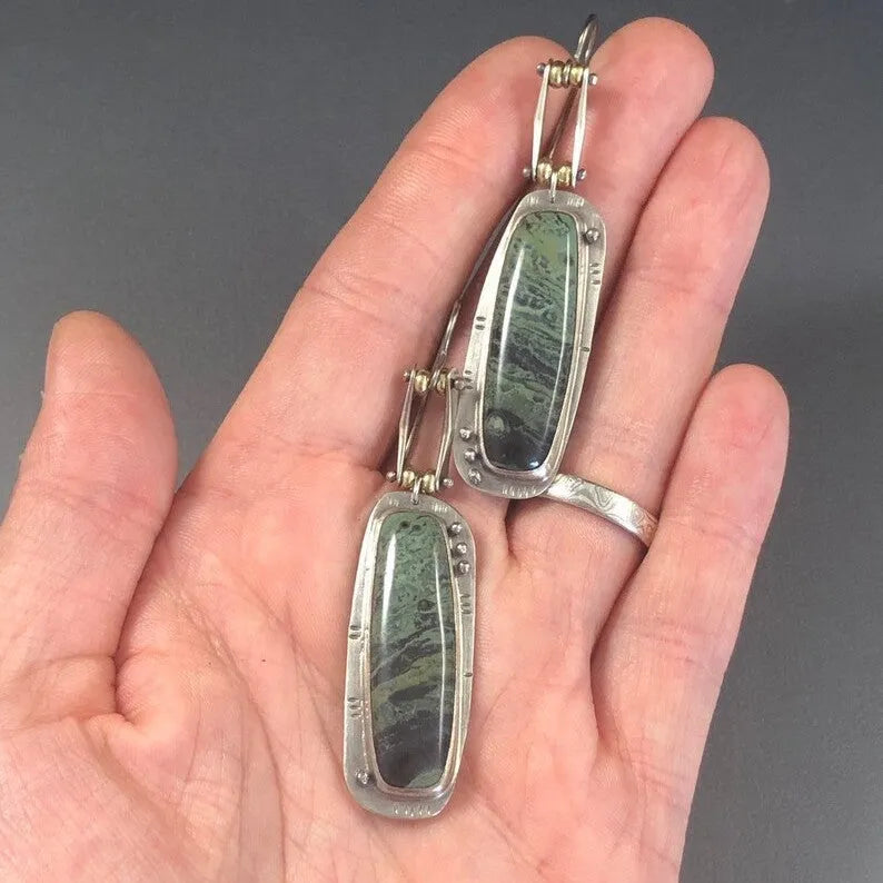 Geometric two-tone marble pattern alloy earrings showing angular shape with marbled colour detailing
