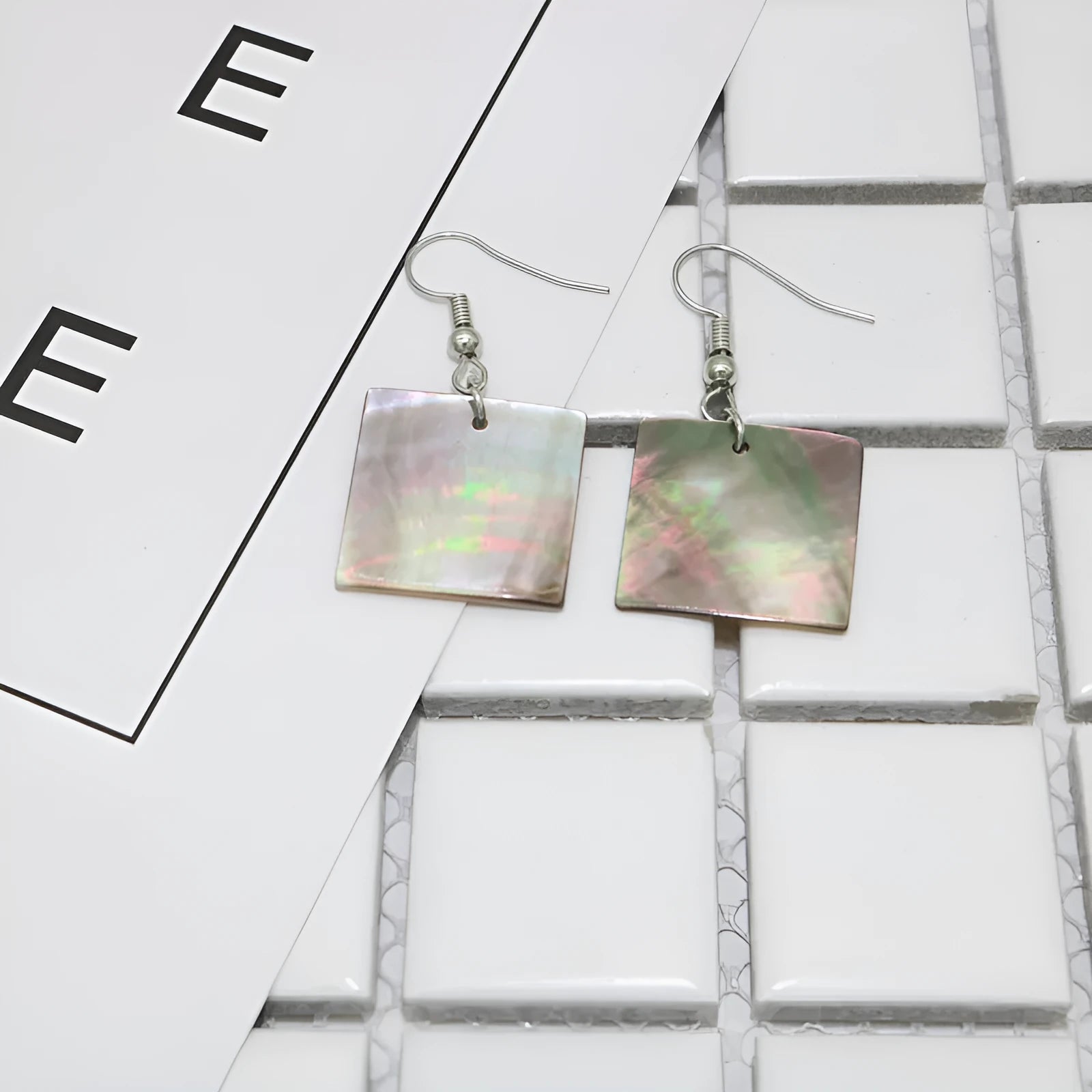 Geometric shell earrings with natural retro styling in square panther or rectangular shell colour options
