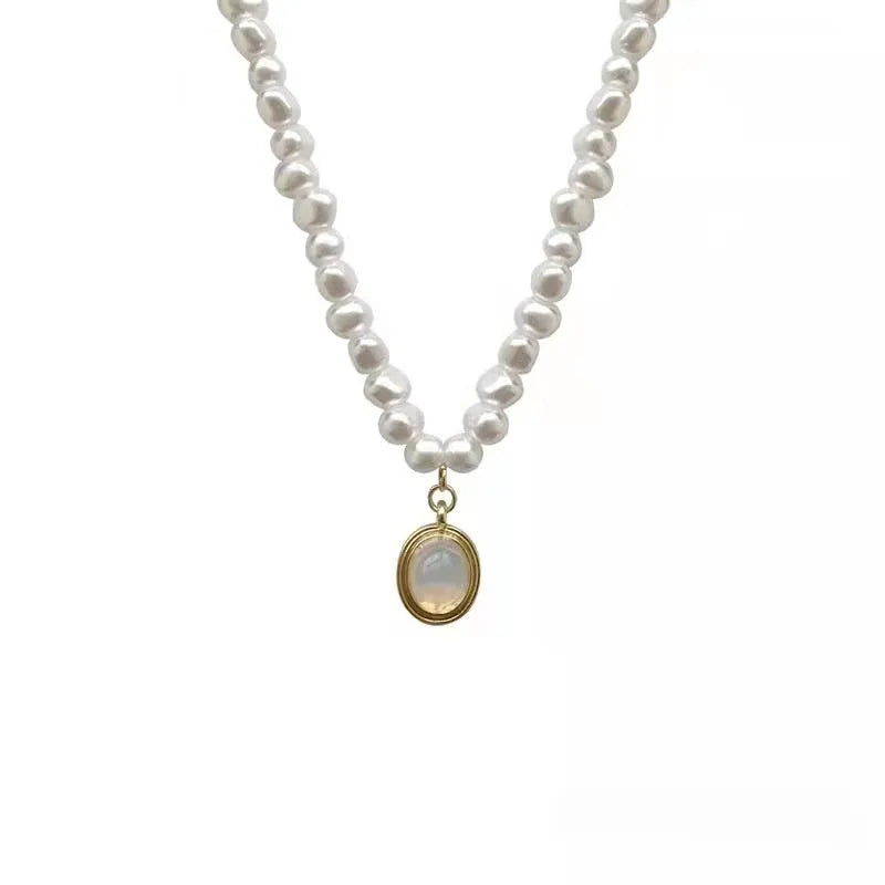 French Court vintage-style alloy necklace with a geometric charm on an adjustable chain.