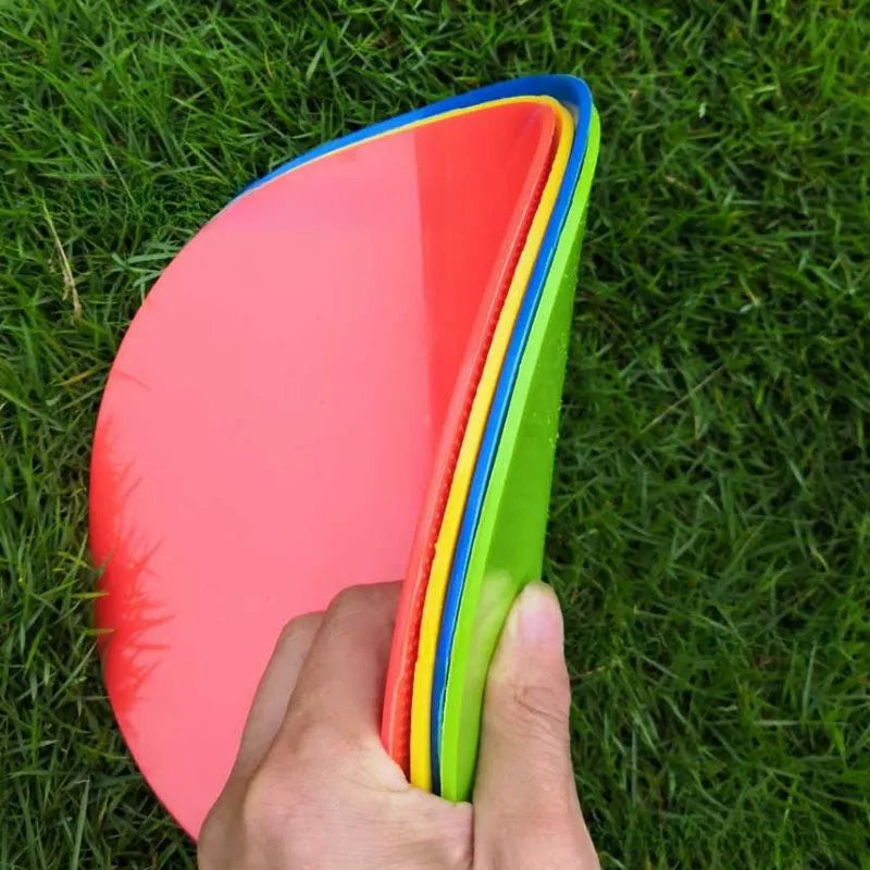 Coloured TPE football training disc marker 23cm diameter on grass field