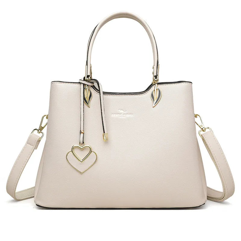 Women's multilayer shoulder messenger bag in PU leather with sewing thread details
