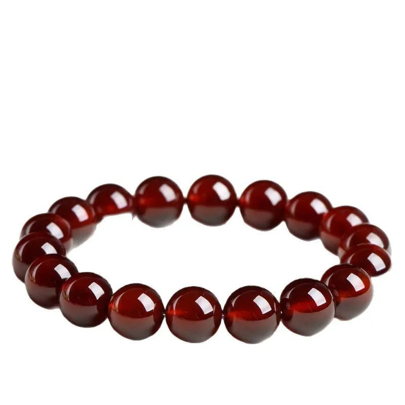 Natural Orange Red Garnet ball crystal bracelet with retro styling and Ruyi element in unisex design