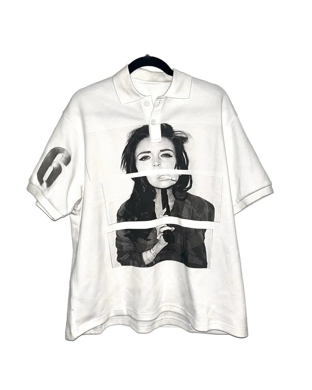Short sleeved polyester polo shirt with a printed pattern, shown in a straight cut and medium length.