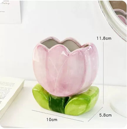 Ceramic flower pen holder storage box with floral design on desktop