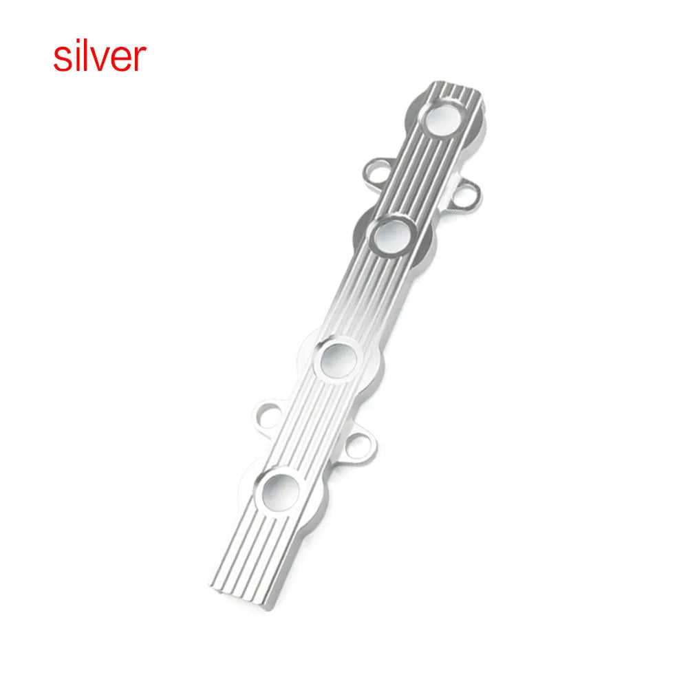 Aluminium alloy engine harness housing bracket in blue, red, and silver, showing versions with and without mounting holes.