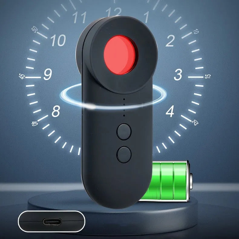 Black portable GPS and WiFi signal detector with laser scanner for hidden cameras on a table.